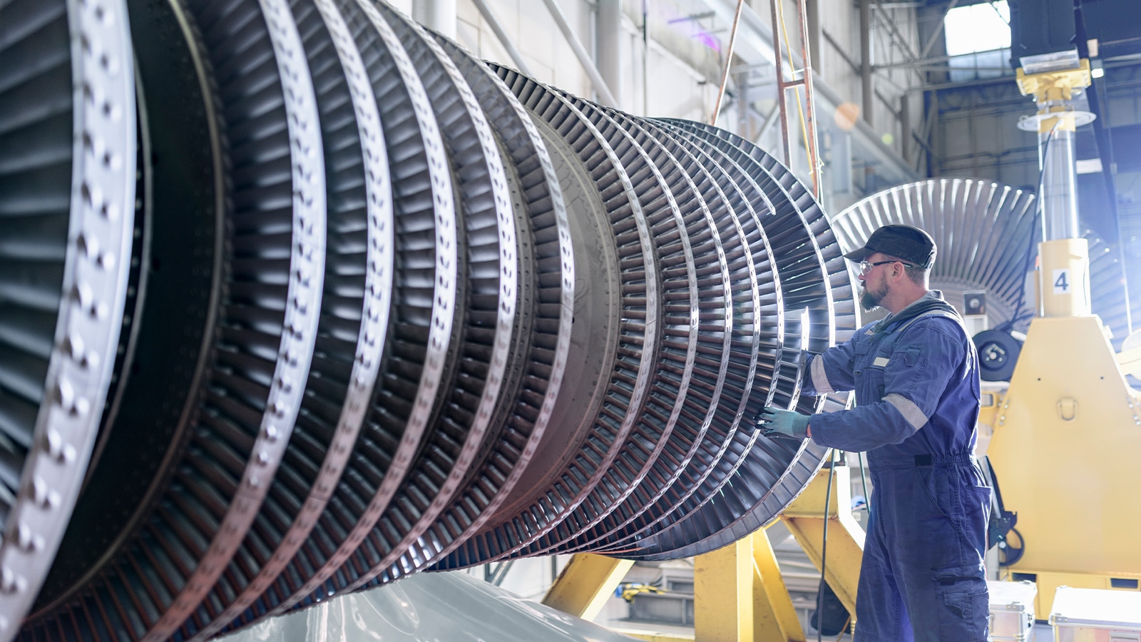 Worker Working On Steam Turbine